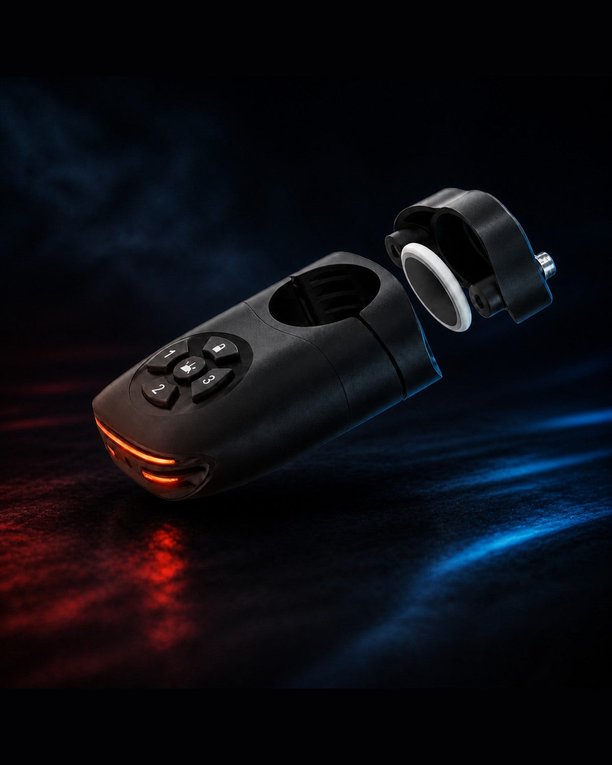 Find My-ready alarm bike tail light and remote photographed on a dark blue surface