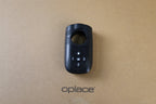 Find My-ready alarm bike tail light displayed on an OPlace box with its control buttons visible