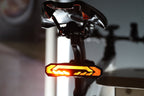 Amber brake-light pattern on OPlace tail light mounted under a saddle