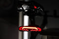 Smart Bike Tail Light with 110dB Siren Alarm, OPlace Gear Weatherproof Brake Sensing Rear Light, USB Rechargeable Safety Lamp - OPlace